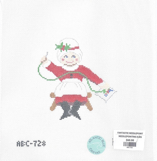 Needlepointing Mrs Claus